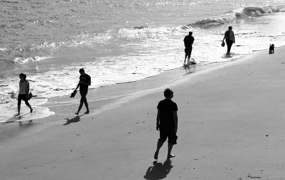 People in the beach - A W Hanson IMAGES