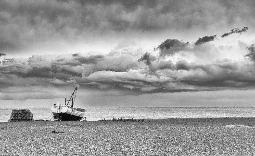 Photography boat in the rocks - A W Hanson IMAGES